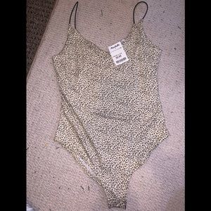 Marshall’s cheetah print body suit